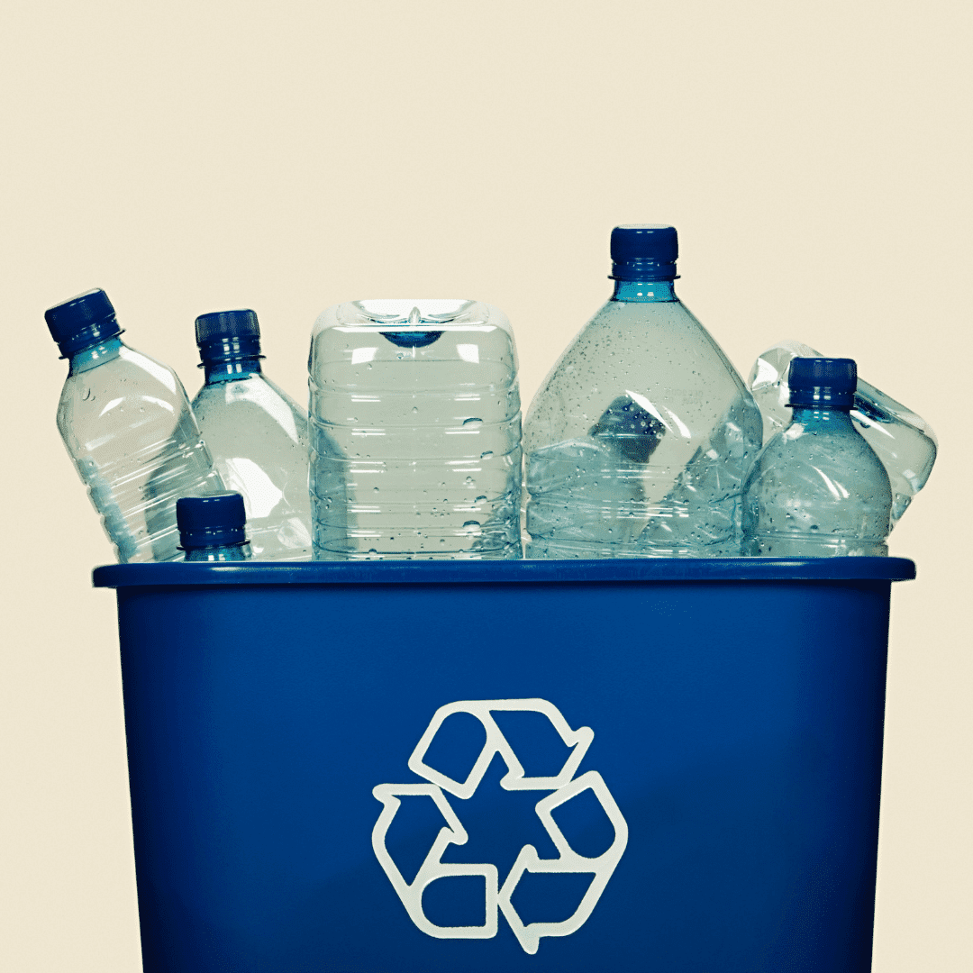 Group of empty bottles in a recycling basket