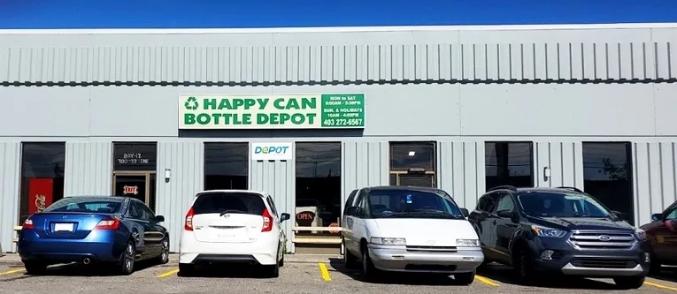 Happy Can Bottle Depot storefront with cars parked in the parking lot