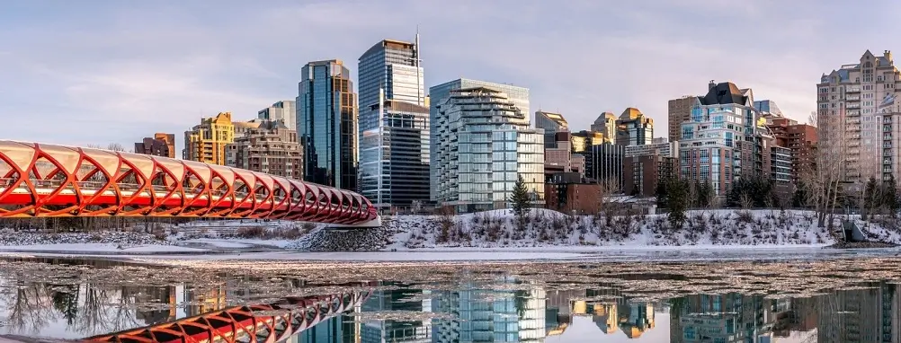 Beautiful Calgary skyline in winter with a bridge and a river